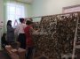 В Курске в школе картинга плетут маскировочные сети для участников СВО